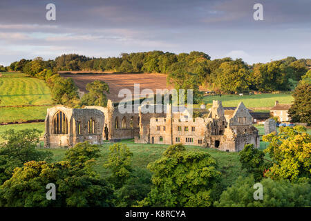 Early Morning Light Illuminating the Ruins of Egglestone Abbey near Barnard Castle, County Durham, in Early Autumn UK Stock Photo