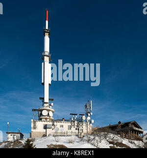 Television transmitter at the Petit Mont Rond summit, Jura, France Stock Photo