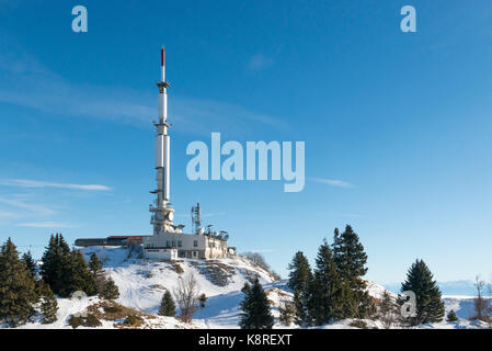 Television transmitter at the Petit Mont Rond summit, Jura, France Stock Photo