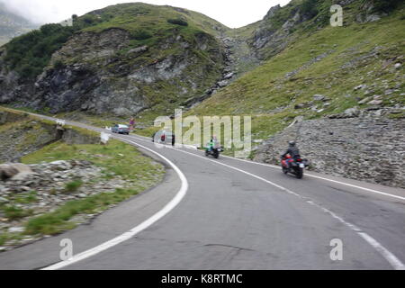 Bikers and cars on the most beautiful road in Europe, Transfagarasan, Arges, Romania Stock Photo