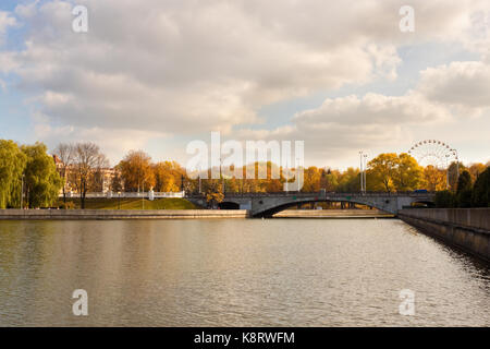 View of Svisloch river and a bridge over it in a central part of Minsk, a capital of Belarus. Stock Photo
