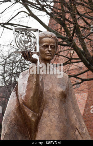 Warsaw, Poland - February 25, 2015: Sculpture of Marie Sklodowska-Curie by polish sculptor Bronislaw Krzysztof. The Nobel prize winning scientist is h Stock Photo
