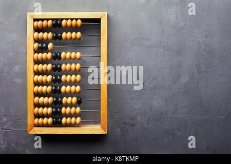 Accounting abacus on gray textured background with copy space Stock Photo