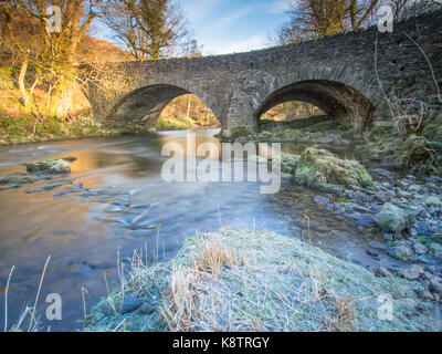 The road bridge over the River Brathay at Clappersgate near Ambleside.  I have been hunting around for details on this bridge, but there seems to be l Stock Photo