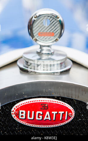 Nameplate and thermometer at radiator grille of Bugatti classic car Stock Photo