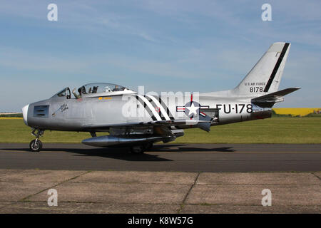 Golden Apples North American F-186A Sabre taxing back to the line at Duxford after a show in 2013. It was sold to the US the following year. Stock Photo