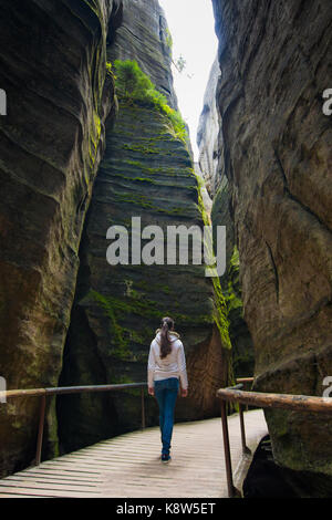 Woman in Unique rocks mountain Adrspasske skaly in national park Adrspach, Czech republic Stock Photo