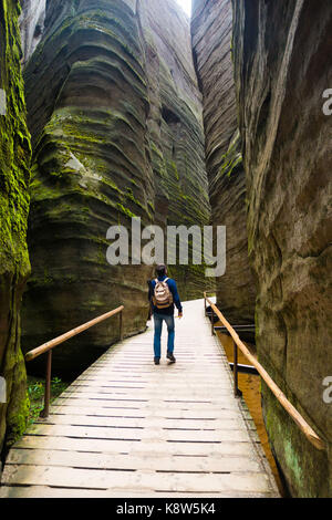 Man in Unique rocks mountain Adrspasske skaly in national park Adrspach, Czech republic Stock Photo