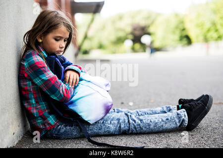 primary student depress at the school Stock Photo