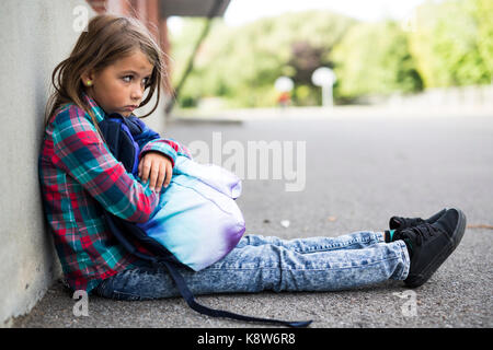 primary student depress at the school Stock Photo