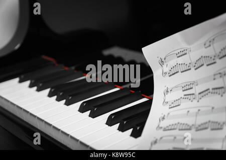 Piano keys on black classical grand piano play Stock Photo