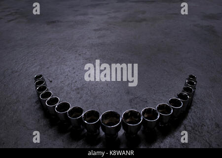Sockets On Concrete Floor Stock Photo