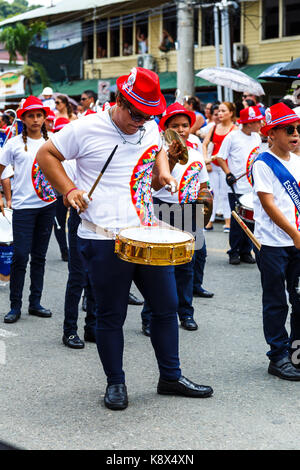 Drummer in a high school band marching in the 2017 Independence Day parade in Quepos, Costa RIca Stock Photo