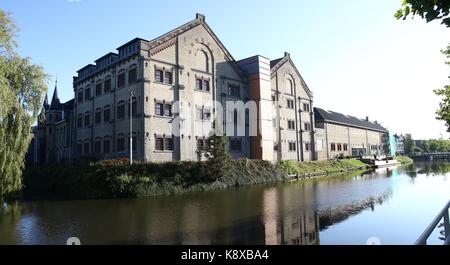 Blokhuispoort, former penitentiary facility at Zuider Stadsgracht canal in Leeuwarden, Friesland, The Netherlands. Stitch of 2 images. Stock Photo
