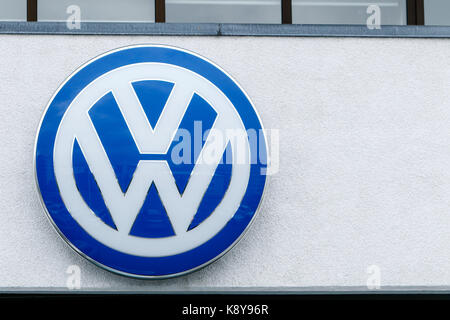 Volkswagen logo is put up on display at their dealership in Reykjavik. Stock Photo