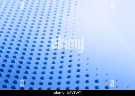 Abstract light colored surface with holes built in a row for creativity, wallpapers and backgrounds. Stock Photo