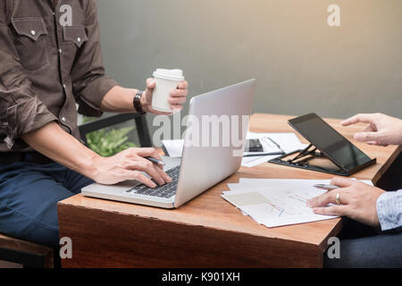 Business meeting  in outdoor. documents account managers crew working with new startup project Idea presentation, analyse marketing plans. Stock Photo