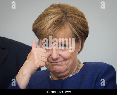 Giessen, Germany. 21st September, 2017. German Chancellor Angela Merkel (CDU) on stage at a Hesse CDU election campaign event in Giessen, Germany, 21 September 2017. Credit: Frank Rumpenhorst/dpa/Alamy Live News Stock Photo