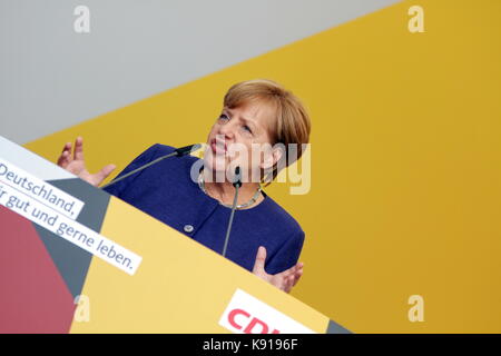 Giessen, Germany. 21st September, 2017. Angela Merkel, Chancellor of Germany holds an election campaign speech as leader of the Christian Democratic Union and leading candidate as federal chancellor  to the federal Bundestag elections (24th Sept 2017) at Brandplatz in Giessen, Germany. Credit: Christian Lademann Stock Photo