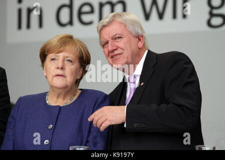 Giessen, Germany. 21st September, 2017. Angela Merkel, Chancellor of Germany holds an election campaign speech as leader of the Christian Democratic Union and leading candidate as federal chancellor  to the federal Bundestag elections (24th Sept 2017) at Brandplatz in Giessen, Germany. Here with Volker Bouffier (CDU), prime minister of german state Hesse. Credit: Christian Lademann Stock Photo