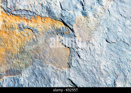 rocks stone and red orange gneiss in the wall of morocco Stock Photo