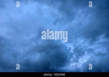 Bad weather and dramatic dark stormy clouds just before the rain storm Stock Photo