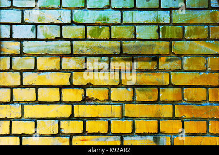 Gold yellow brick wall texture with scratched grungy surface Stock Photo