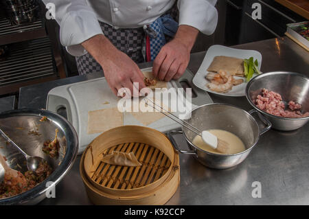 preparation of Dim Sum, Restaurant Allegria, Chef Alexander Tschebull, Hamburg, Germany Stock Photo