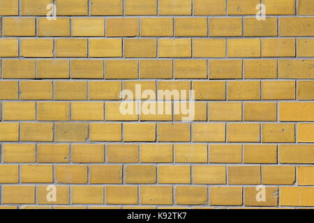 yellow brick wall as a background texture Stock Photo