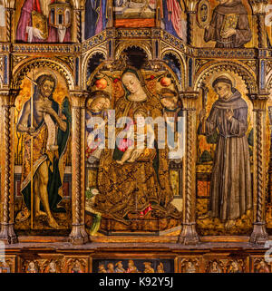 Italy Marche San Severino Marche -picture gallery- Vittore Crivelli -polyptych - Madonna and Child in the center, left St. John the Baptist and right St. Francis Stock Photo