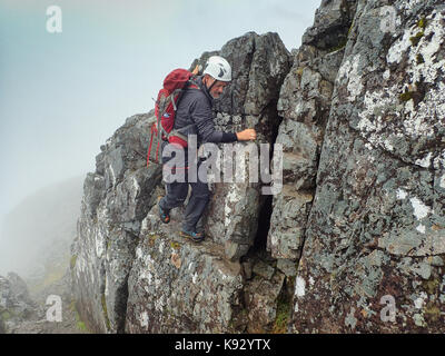 Climbing Ledge Route on Ben Nevis, Scotland, Scottish Highlands Stock Photo