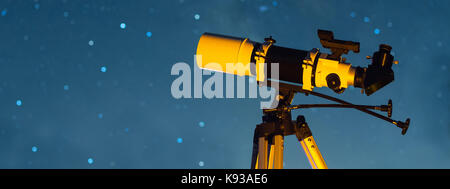 Astronomical Telescope Pointed at the Starry Sky in the Night Stock Photo