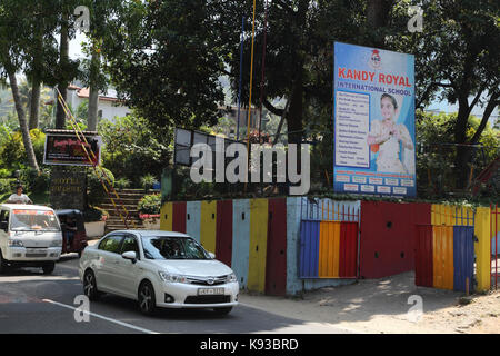 Kandy Sri Lanka Traffic outside Kandy Royal International School (KRIS) and Hotel Suisse Stock Photo