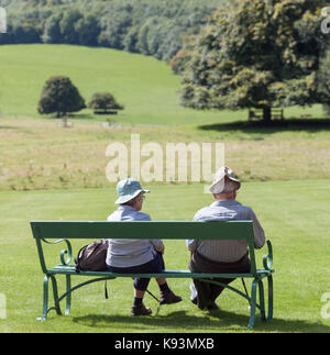 Senior couple on a park bench. Stock Photo