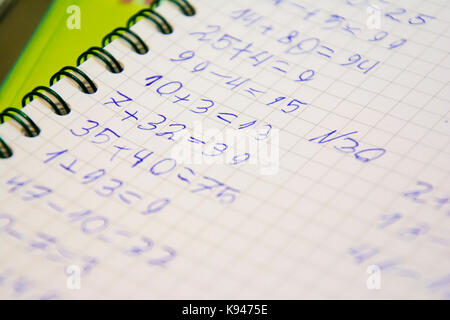 notebook with handwritten mathematical equations Stock Photo