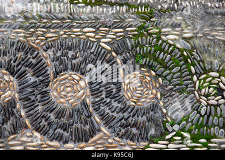 decorative pavement made with stones typical in andalusia. Spain Stock Photo