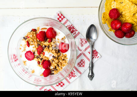 Granola muesli and strawberries for a healthy breakfast Stock Photo