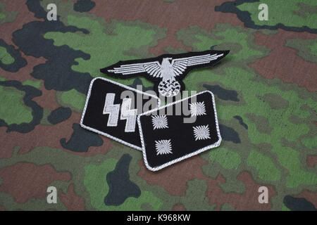 WW2 German Waffen-SS military insignia on SS camouflage uniform