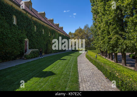 adult woman, woman, tourist, visitor, visiting, winery building, Jordan Winery, Healdsburg, Alexander Valley, Sonoma County, California, United States Stock Photo