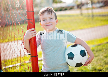 Young caucassian soccer player football Stock Photo