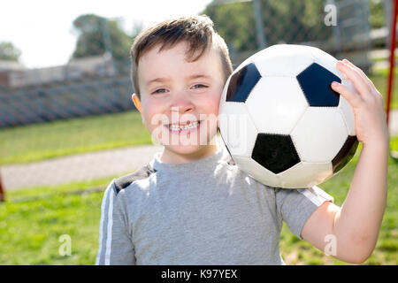 Young caucassian soccer player football Stock Photo