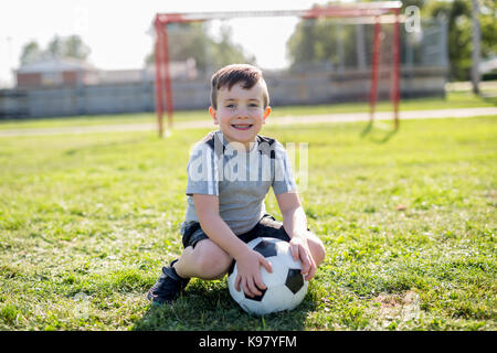 Young caucassian soccer player football Stock Photo