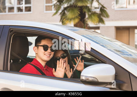 Couple taking a selfie in the car Stock Photo