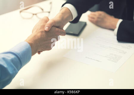 handshake after successful job interview at office Stock Photo