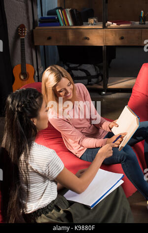 multiethnic students studying with book  Stock Photo