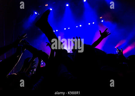 a crowd shadow of people at during a concert Stock Photo