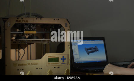 Electronic three dimensional plastic printer during work , 3D printer, 3D printing Stock Photo