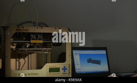 Electronic three dimensional plastic printer during work , 3D printer, 3D printing Stock Photo
