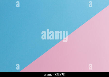 Soft pink and light blue pastel colored paper background. Stock Photo