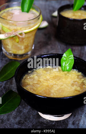 Vietnamese food for dessert, che buoi or grapefruit sweet gruel, a popular sweet soup from grape fruit slivered rind with green bean, coconut milk